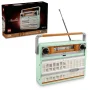 Mintgrünes LEGO Retro-Radio mit Teleskopantenne, schwarzen Knöpfen und Lautsprechergitter, mit Verpackung gezeigt