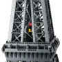 Detailansicht des LEGO Eiffelturms mit grauer Metallstruktur und roten sowie gelben Minifiguren auf einer Plattform