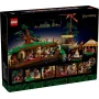 LEGO Auenland-Box mit Hobbit-Häusern unter grünen Hügeln, sichtbare Figuren und Innendetails