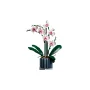 LEGO-Orchidee mit weißen Blüten mit rosa Zentren, grünen Blättern und grauem geripptem Topf auf weißem Hintergrund LEGO-Orchidee mit weißen Blüten mit rosa Zentren, grünen Blättern und grauem geripptem Topf auf weißem Hintergrund