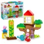 Aufgebautes LEGO Duplo Set mit Baumhaus, Peppa Pig Figuren, Sonnenblume, blauer Gießkanne und Gartengeräten
