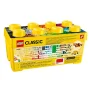Boîte de rangement LEGO Classic jaune 10696 avec couvercle transparent montrant les briques colorées à l'intérieur