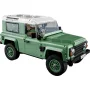 Land Rover Defender 90 LEGO vert avec toit blanc, capot ouvert révélant le moteur détaillé, vue trois-quarts avant