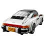 Porsche 911 Targa LEGO blanche avec toit souple noir, phares détaillés et plaque d'immatriculation P51AK3, vue en perspective arrière