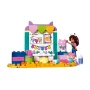 LEGO DUPLO craft workshop with character holding baby, colorful workbench, paint pots and creative wall decorations LEGO DUPLO craft workshop with character holding baby, colorful workbench, paint pots and creative wall decorations
