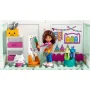 Creative workshop interior with Gabby holding paint palette, colorful shelves, white cat and art supplies Creative workshop interior with Gabby holding paint palette, colorful shelves, white cat and art supplies