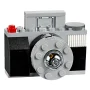 LEGO camera built with gray and black bricks, transparent circular lens in center, viewfinder on top