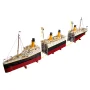 Overview of LEGO Titanic displayed in detachable sections revealing internal structure with orange funnels and red hull Overview of LEGO Titanic displayed in detachable sections revealing internal structure with orange funnels and red hull