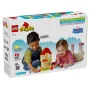 LEGO DUPLO box showing two children playing with Peppa Pig's house and figures for the birthday party LEGO DUPLO box showing two children playing with Peppa Pig's house and figures for the birthday party