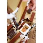 Close-up of the detailed interior of LEGO Endurance ship with cabins, stairs and a hand placing a piece