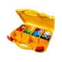 Open yellow LEGO suitcase with red handle, containing colorful bricks sorted in four orange compartments Open yellow LEGO suitcase with red handle, containing colorful bricks sorted in four orange compartments