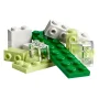 Assortment of green, white and lime LEGO bricks with transparent elements arranged on white background Assortment of green, white and lime LEGO bricks with transparent elements arranged on white background
