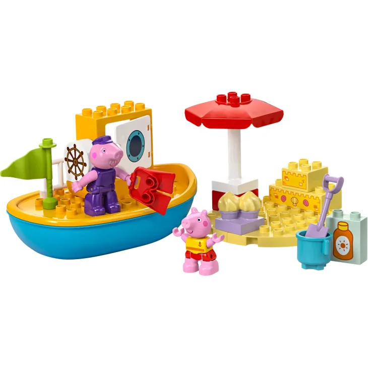 Barca LEGO blu e gialla con personaggi Peppa Pig e Nonno Pig, scena spiaggia con ombrellone rosso, castello di sabbia