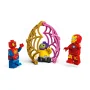 Overzicht van LEGO-set met Spidey, Iron Man, groene schurk in gouden en roze spinnenweb structuur Overzicht van LEGO-set met Spidey, Iron Man, groene schurk in gouden en roze spinnenweb structuur
