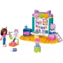 Overzicht van LEGO knutselwerkplaats met figuur met verfspuit, baby, kleurrijke werkbank en creatieve accessoires