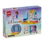 LEGO 10795 doos toont kleurrijke knutselwerkplaats met Olivia minifiguur, baby en bouwaccessoires